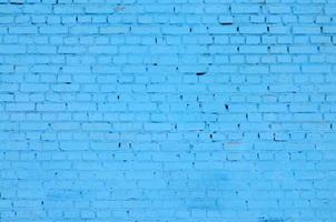 Square brick block wall background and texture. Painted in blue photo