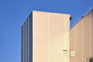 Siding on industrial high-rise building photo