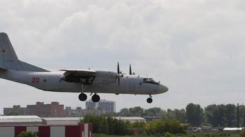 NOVOSIBIRSK, RUSSIAN FEDERATION JULY 15, 2022 - Soviet military transport aircraft Antonov An 26 landing at Tolmachevo airport video