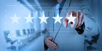 businessman hand touch five stars rate customer rate. photo