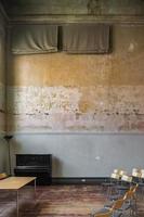 grand piano, or normal piano, in a vintage room, unpainted walls, with dirt and humidity photo