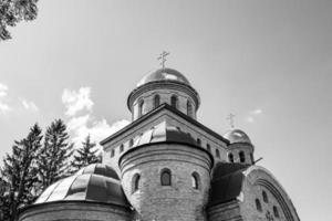 Christian church cross in high steeple tower for prayer photo