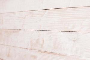 Vintage colored wood background texture with knots and nail holes. Old painted wood wall. Wooden dark horizontal boards. Front view with copy space. photo