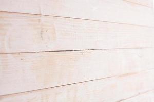 Vintage colored wood background texture with knots and nail holes. Old painted wood wall. Wooden dark horizontal boards. Front view with copy space. photo