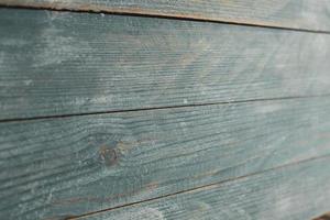 Vintage colored wood background texture with knots and nail holes. Old painted wood wall. Wooden dark horizontal boards. Front view with copy space. photo