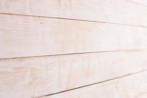 Vintage colored wood background texture with knots and nail holes. Old painted wood wall. Wooden dark horizontal boards. Front view with copy space. photo