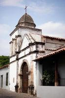 chapel Old building, village church, colonial architecture walls, aged wooden door photo