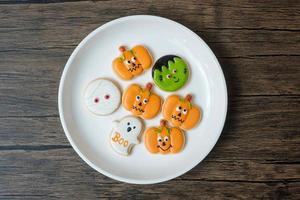 Happy Halloween day with funny Cookies set on wooden table background. Trick or Threat, Hello October, fall autumn, Festive, party and holiday concept photo