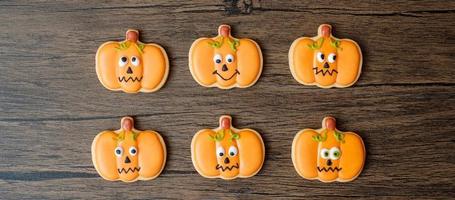 Happy Halloween day with funny Cookies set on wooden table background. Trick or Threat, Hello October, fall autumn, Festive, party and holiday concept photo