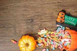 Happy Halloween day with ghost candies, pumpkin,  bowl and decorative. Trick or Threat, Hello October, fall autumn, Festive, party and holiday concept photo