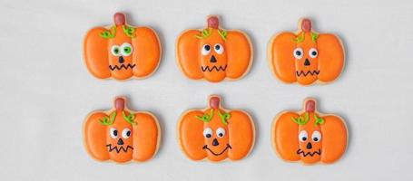 Happy Halloween day with funny Cookies, different Pumpkin biscuits on table background. Trick or Threat, Hello October, fall autumn, Traditional, party and holiday concept photo