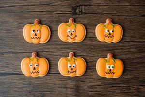 Happy Halloween day with funny Cookies set on wooden table background. Trick or Threat, Hello October, fall autumn, Festive, party and holiday concept photo