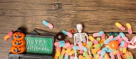 Happy Halloween day with ghost candies, pumpkin,  bowl and decorative. Trick or Threat, Hello October, fall autumn, Festive, party and holiday concept photo