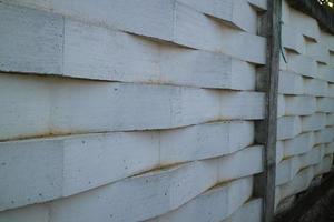 wall of white bricks arranged in a zig zag photo