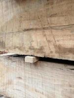 Work in an industrial warehouse. natural wood blocks in lumberyard photo