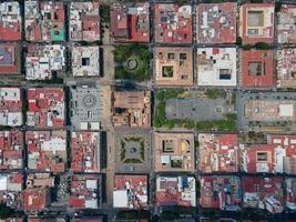 view from the sky, view from above the cross of squares in guadalajara mexico, public squares forming a cross in plan photo