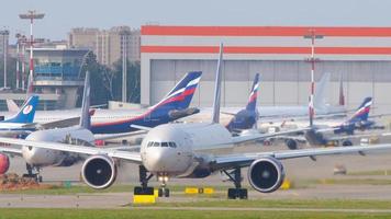 MOSCOW, RUSSIAN FEDERATION SEPTEMBER 12, 2020 - Boeing 777 of Aeroflot airlines taxis on the runway at Sheremetyevo International Airport video