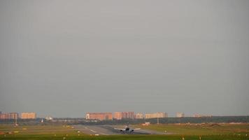 MOSCOW, RUSSIAN FEDERATION SEPTEMBER 12, 2020 - Panoramic view of the airfield of Sheremetyevo airport. Airplane set speed for takeoff. AzurAir passenger plane rides on the taxiway video