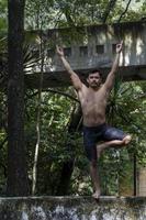 Yoga meditation outdoors. Glowing seven all chakra. man practice yoga, mexico, gualdajara photo