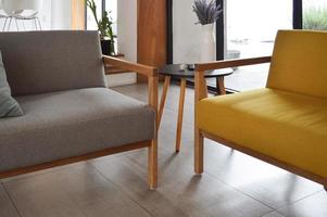 Cozy scandinavian style and modern design at home. solid wood, hardwood and fabric chair