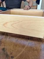 band saw wood cutting, back of an armchair, furniture design, the wood is natural oak, solid wood or hardwood.