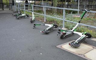 Cologne, NRW, Germany, 2019 - E-mobility in Germany - discarded electric scooters near a train station in Cologne. photo