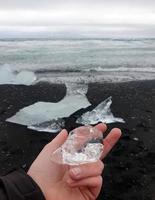 glacial ice washed ashore at Diamond Beach, Iceland photo