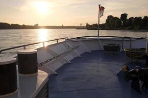 Koenigswinter, NRW, Germany, 2019 - View from a river boat on the river Rhine on a sunny day. photo