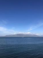 Distant mountain seen from the coast of Reykjavik, Iceland photo