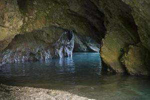 Cliffs and water in the cave at Myrtos Beach at the island of Kefalonia photo