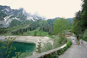 Mother with kids at Vorderer Gosausee, Gosau, Upper Austria. photo