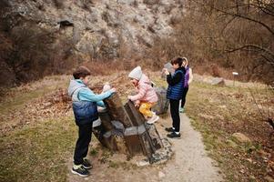 Family at Turold science trail, Mikulov, Czech Republic learn types of rock breeds. photo