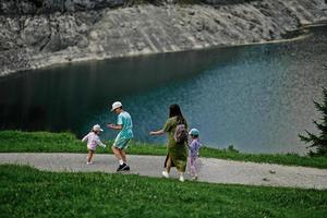 Mother with kids at Vorderer Gosausee, Gosau, Upper Austria. photo