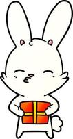 curious bunny cartoon with present vector
