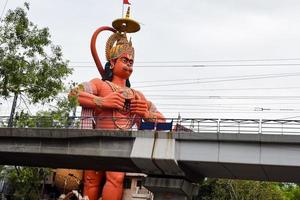 Big statue of Lord Hanuman near the delhi metro bridge situated near Karol Bagh, Delhi, India, Lord Hanuman big statue touching sky photo