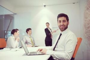 young business man at meeting photo