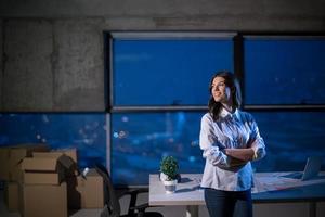 young female architect and engineer on construction site photo