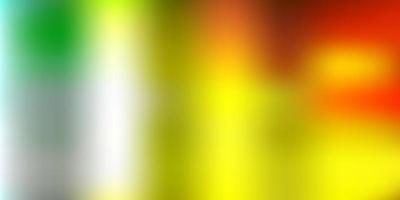 Light green, yellow vector abstract blur drawing.