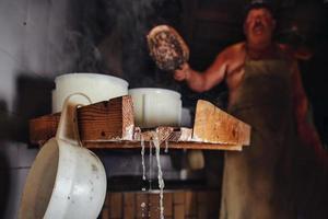 Genuine ricotta inside alpine hut in northern Italy with herdsman photo