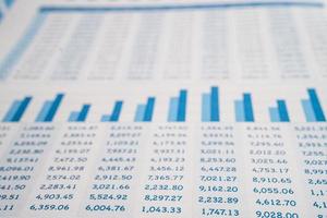 Spreadsheet paper with graph. Finance, Account, Statistics, Analytic research data economy, Stock exchange trading and Business company meeting concept photo