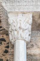 St Michael Abbey - Sacra di San Michele - Italy. Gargoyle monster sculpture, 11th Century. photo