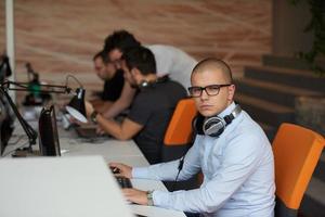 startup business, software developer working on computer photo