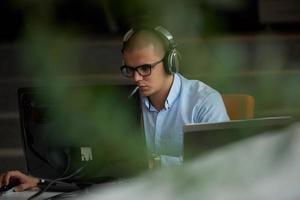 startup business, software developer working on computer photo