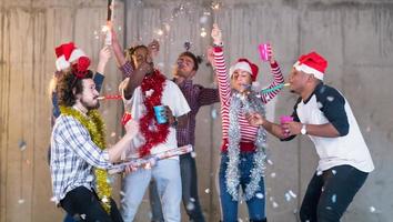 multiethnic group of casual business people having confetti party photo