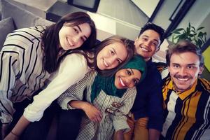 group of casual multiethnic business people taking selfie photo