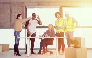 group of multiethnic business people on construction site photo