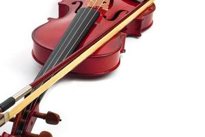 Close up of Violin Against on white background with copy space. Instrument and musical concept. photo