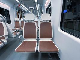 empty train car seats, train mode of transportation photo