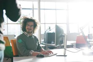 businessman working using a computer in startup office photo