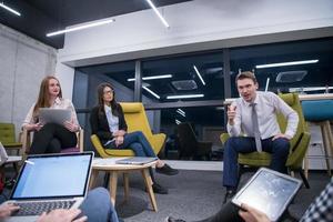 Multiethnic startup business team having meeting photo
